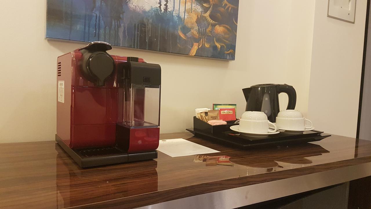 Tio Sea Resort El Hor Dış mekan fotoğraf A Nespresso coffee machine in a hotel room